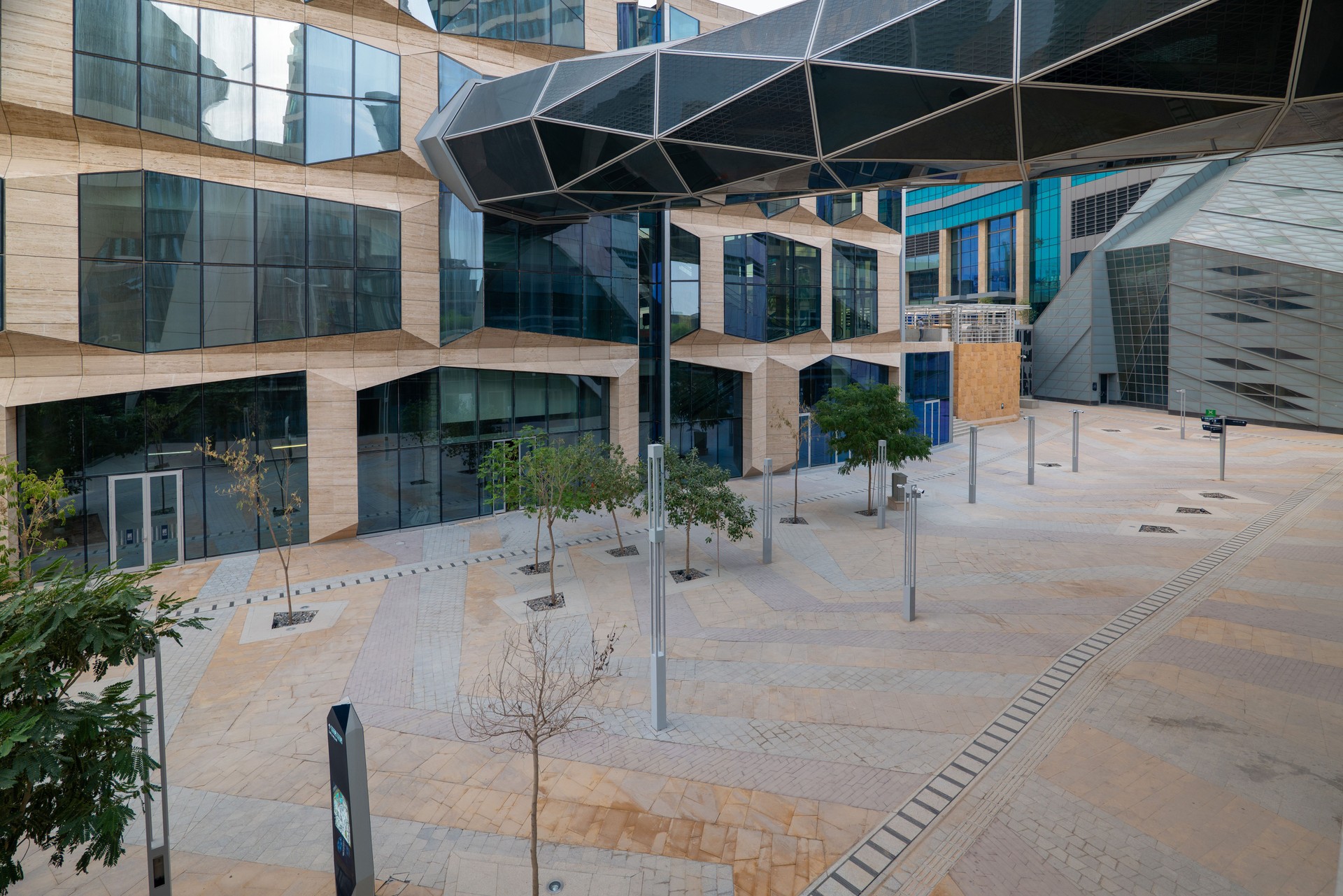 Architectural detail of a modern skyscraper in the King Abdullah Financial District KAFD, Riyadh, Saudi Arabia. Architectural detail of a modern skyscraper in the King Abdullah Financial District KAFD, Riyadh, Saudi Arabia.